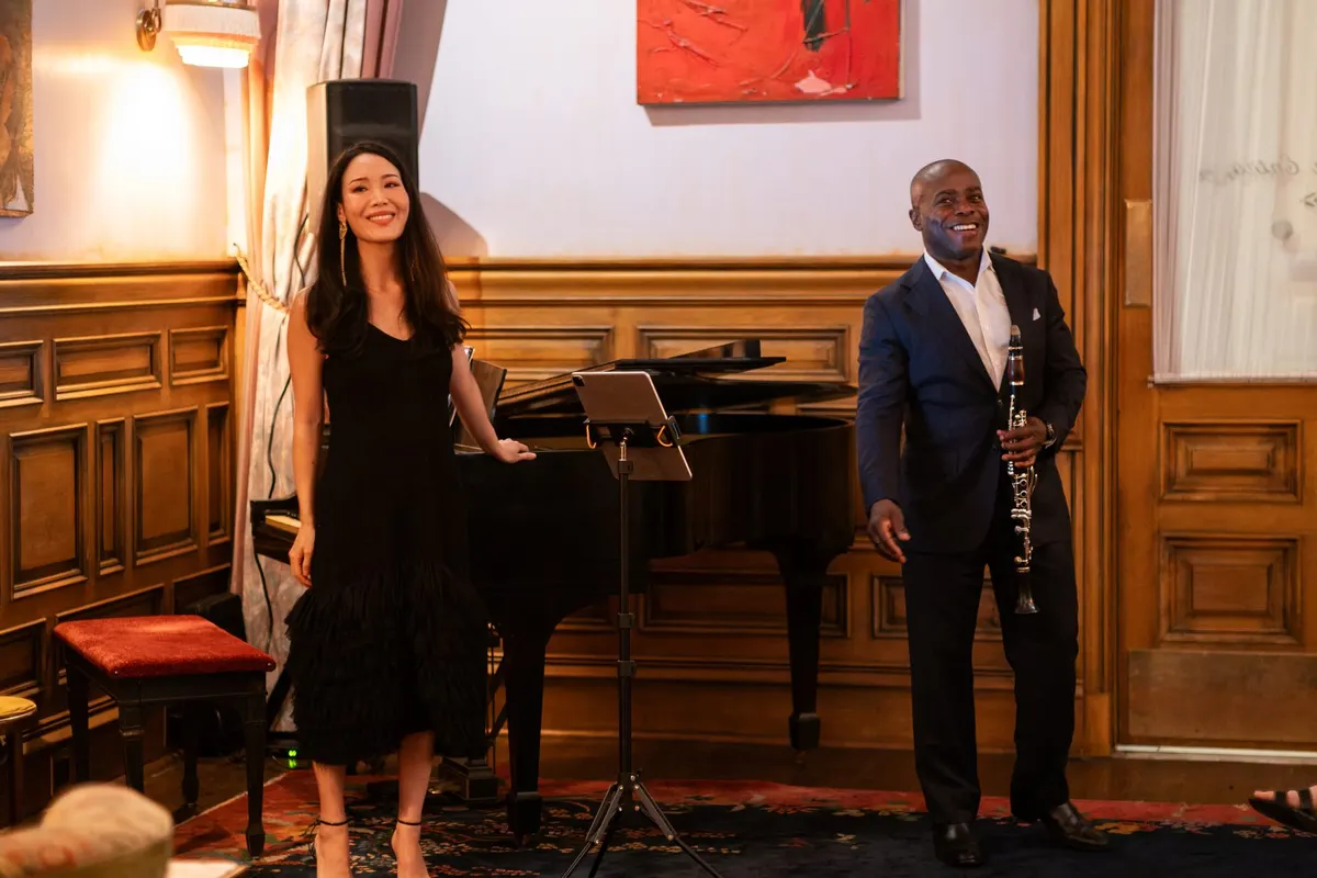 Rieko and Anthony taking the applause by the piano